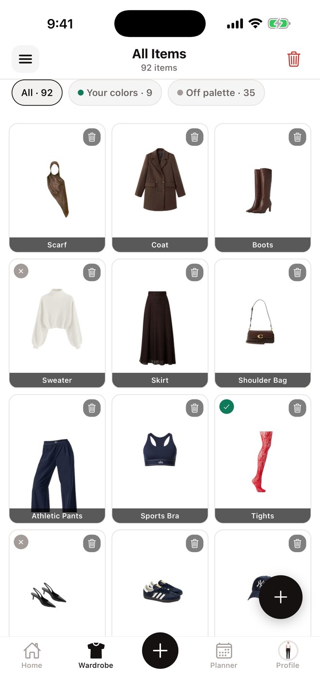 The FitMe wardrobe showing 92 items, including a scarf, coat, boots, sweater, skirt and shoulder bag, with filters for your colours.