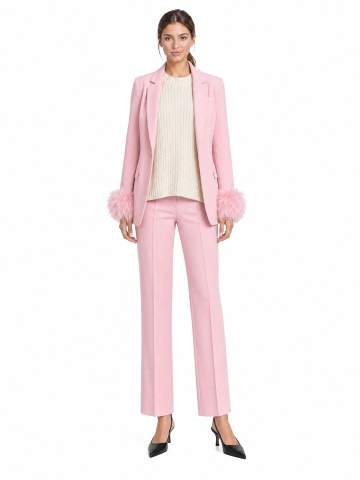 The same avatar wearing a pink suit with feather cuffs.